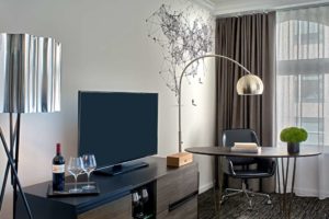 Hotel Zelos San Francisco Desk and TV in the Deluxe Double Guestroom