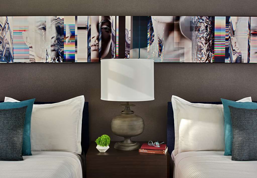 Hotel Zelos San Francisco Beds and Side Table in the Deluxe Double Guestroom