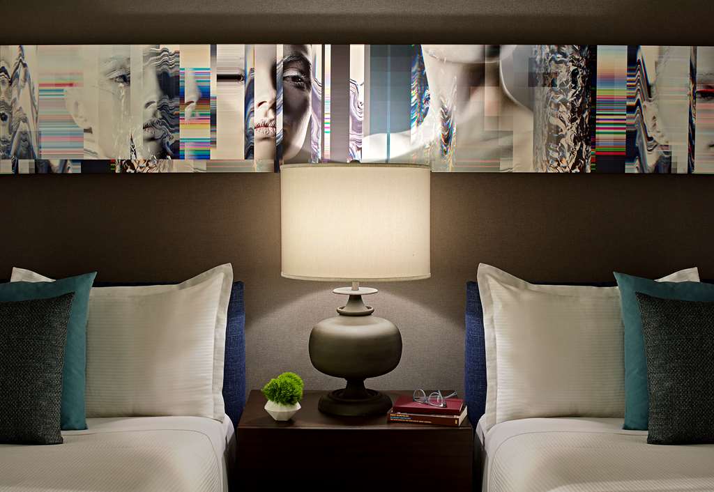 Hotel Zelos San Francisco Beds and Side Table in the Deluxe Double Guestroom