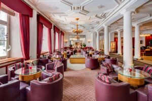 Kempinski Grand Hotel des Bains St.Moritz Kempinski Bar Tables 1.jpg