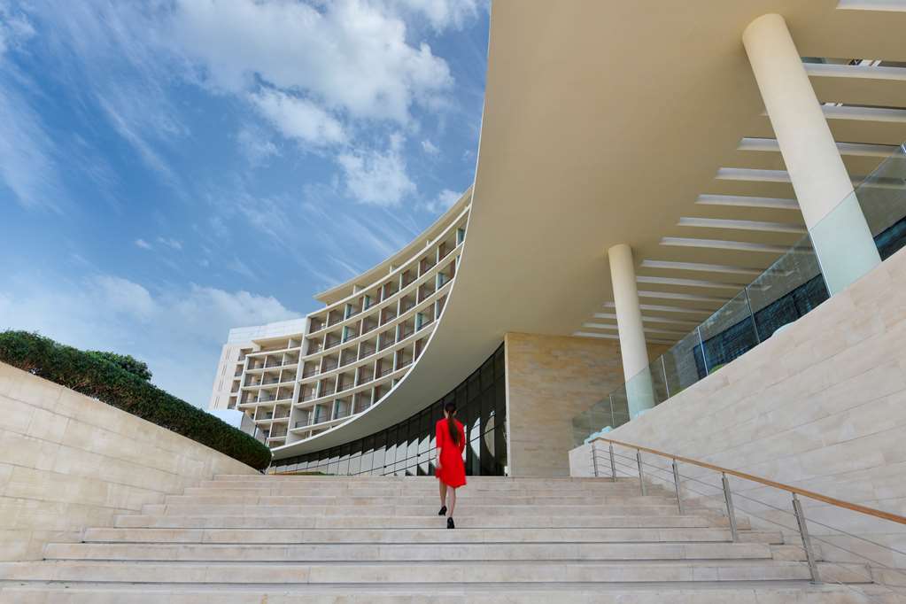 Kempinski Hotel Aqaba Lady In Red in Signature Shot.
