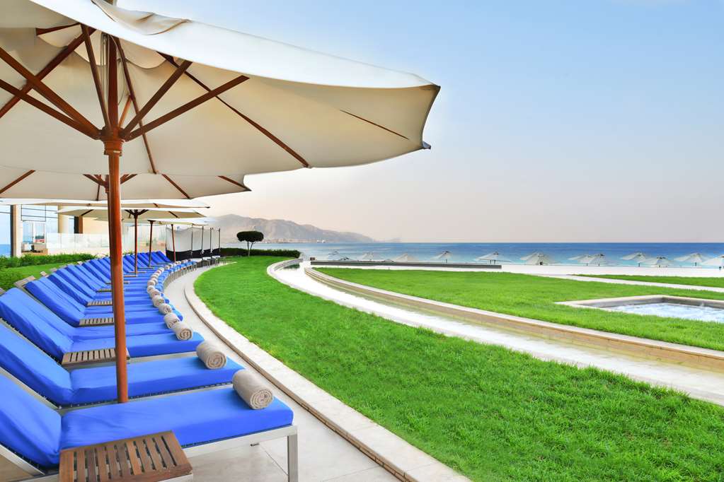 Kempinski Hotel Aqaba Sunbeds and beach.