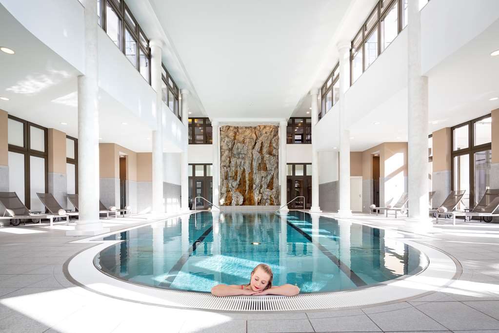 Kempinski Grand Hotel des Bains St.Moritz Pool with girl on the edge